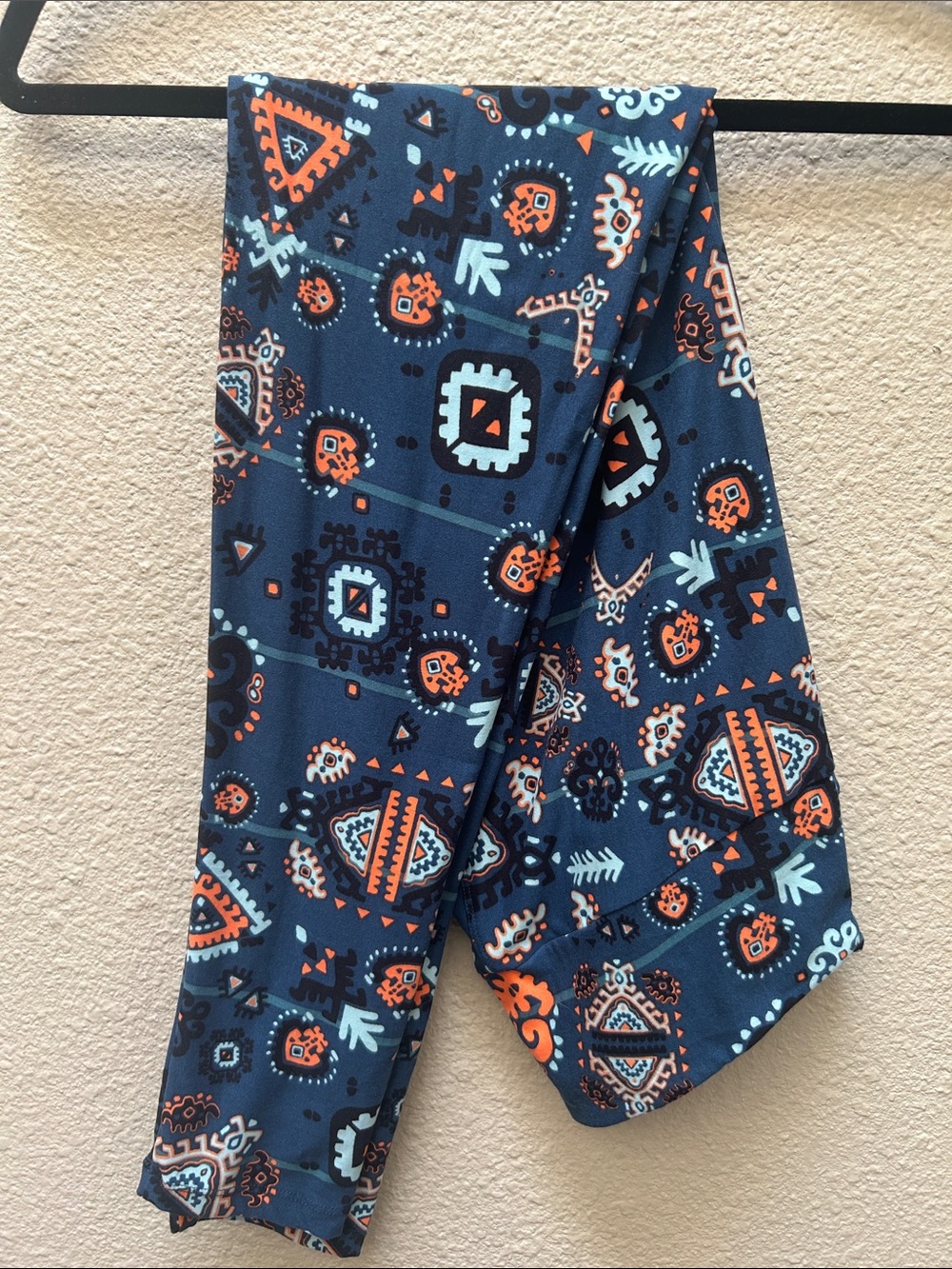 LuLaRoe Navy Blue Printed Leggings with Orange & Light Blue Accents